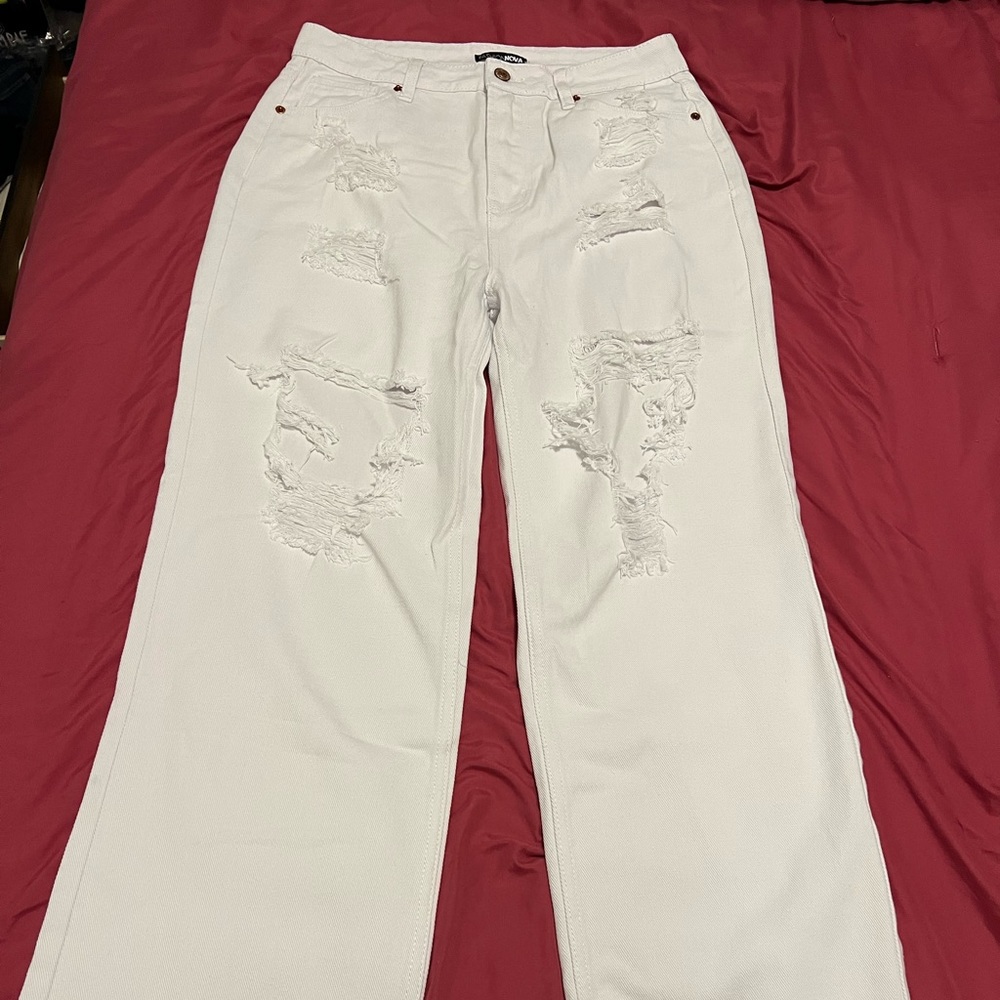 White ripped straight leg jeans